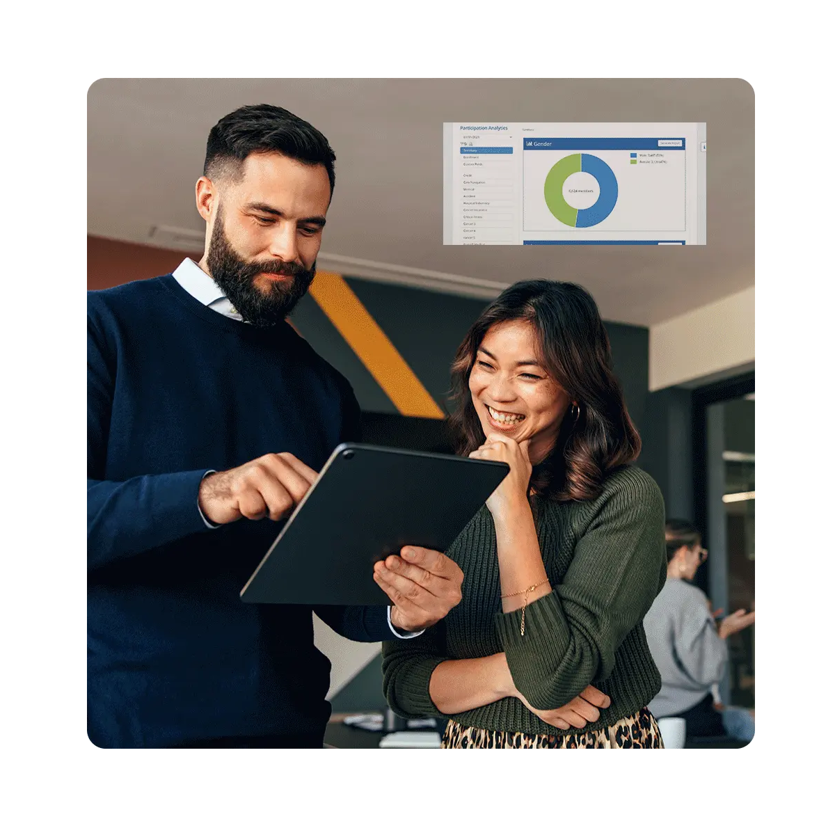 Two people reviewing their reporting dashboard within Benefitsolver on tablet screen.