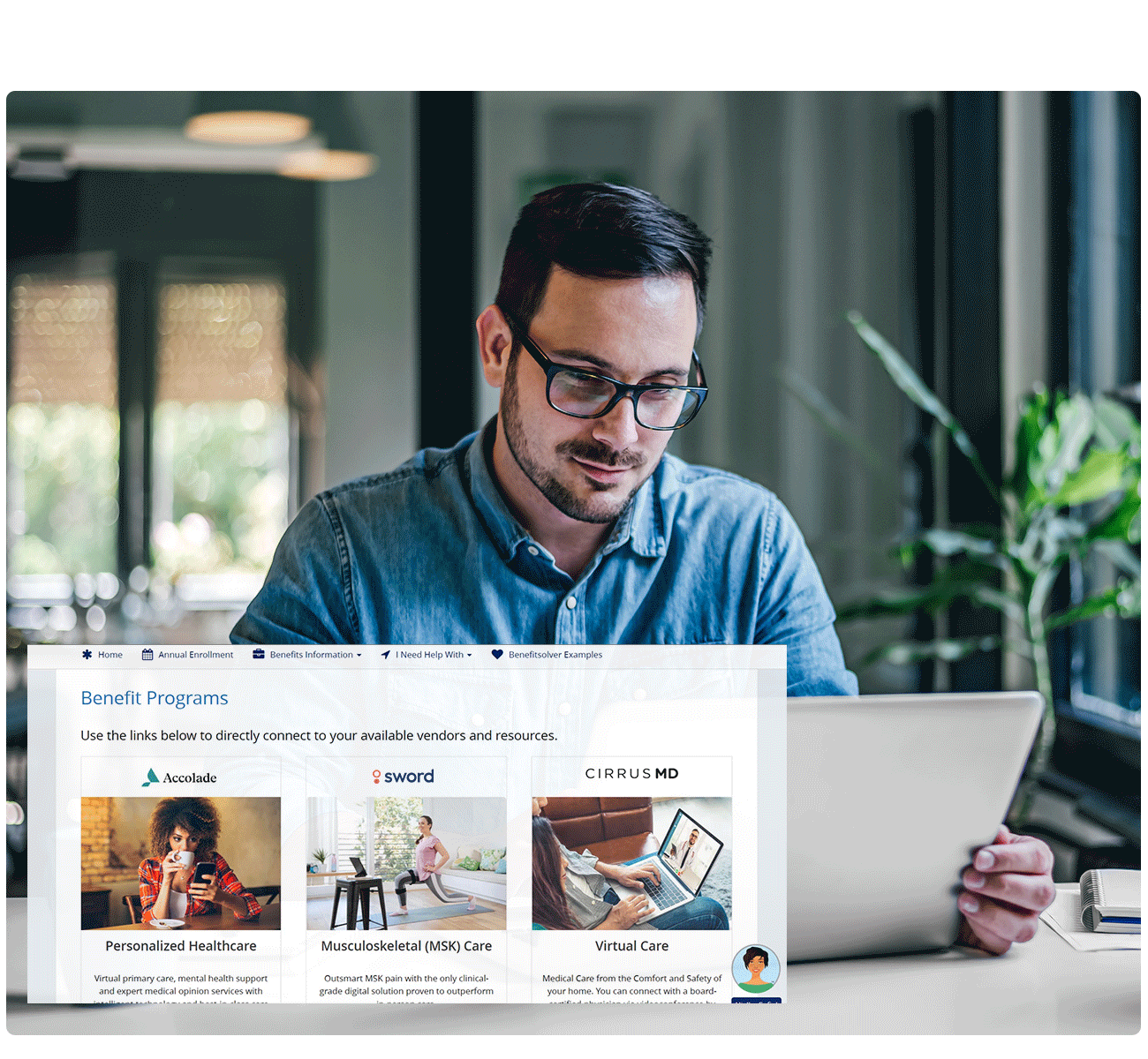 Man looking at benefitsolver on laptop
